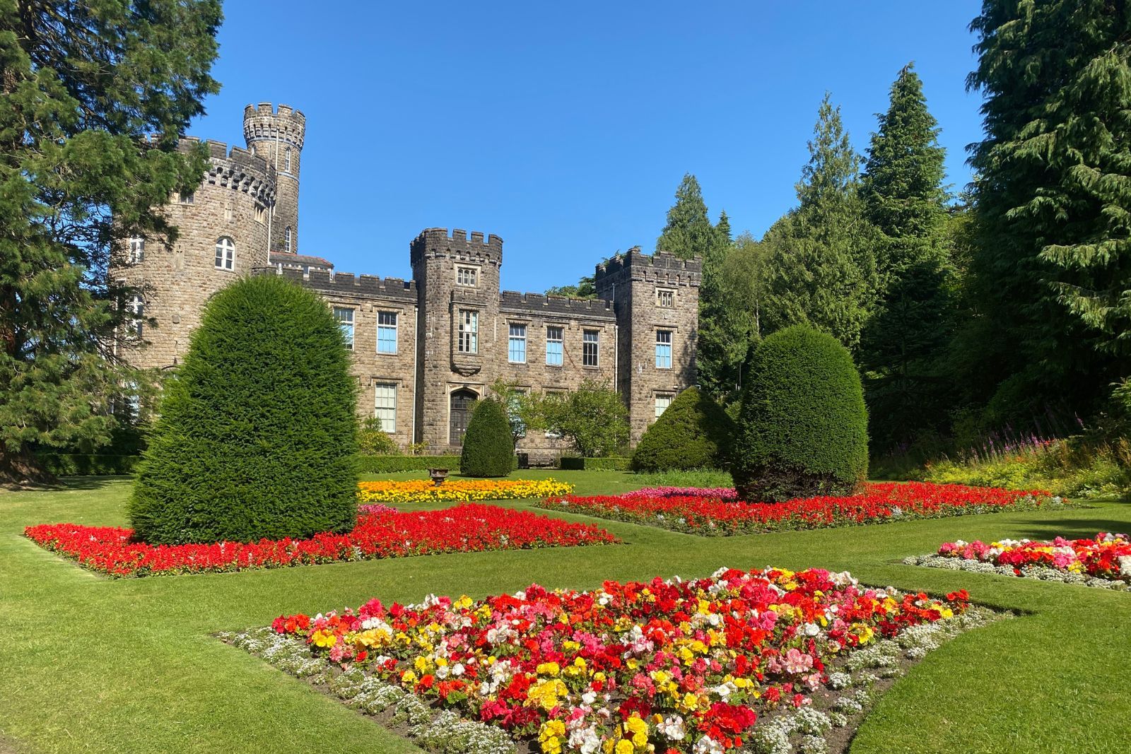 Cyfarthfa Castle surrounded by flower beds.jpg Cyfarthfa Castle surrounded by flower beds.jpg